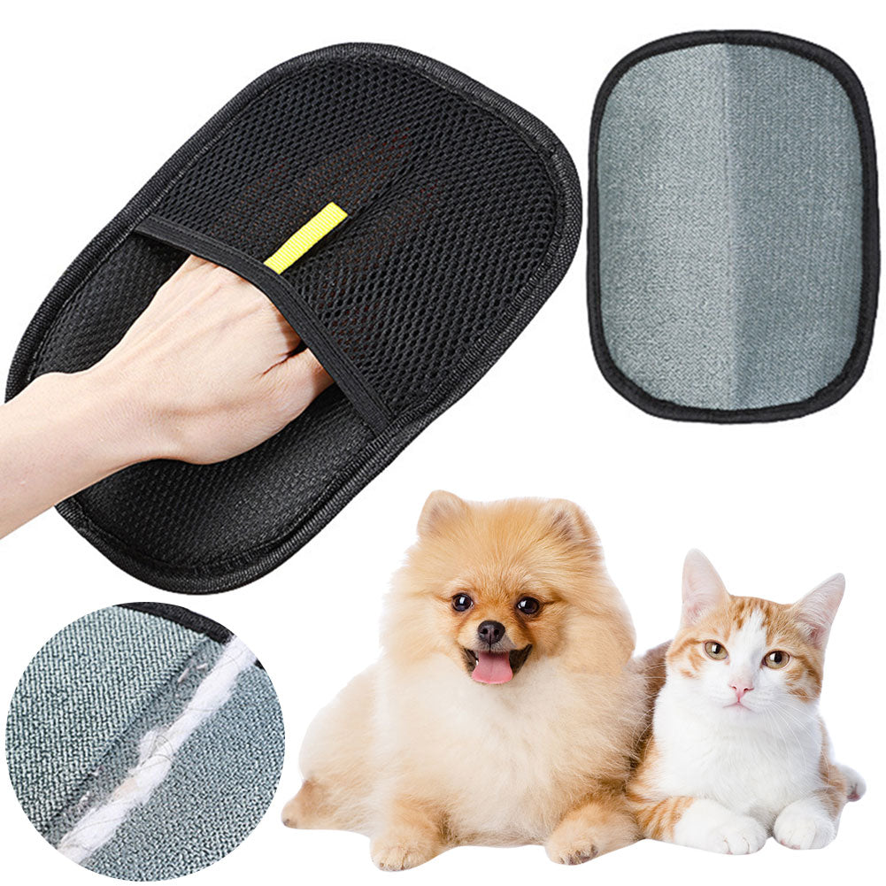 A black pet grooming mitt with a mesh front and a gray textured brush side, shown alongside a dog and cat. A hand is visible holding the mitt open, and a circular inset shows a close-up of the gray bristle texture.