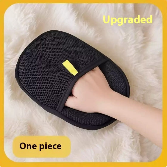 A black mesh one-piece garment or pouch shown on a white faux-fur surface, with a hand inserted into the opening. Yellow text overlays read 'Upgraded' and 'One piece'.