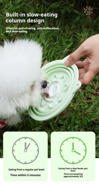 Pet using a green slow-feeding device with text about its benefits in a grassy outdoor setting.