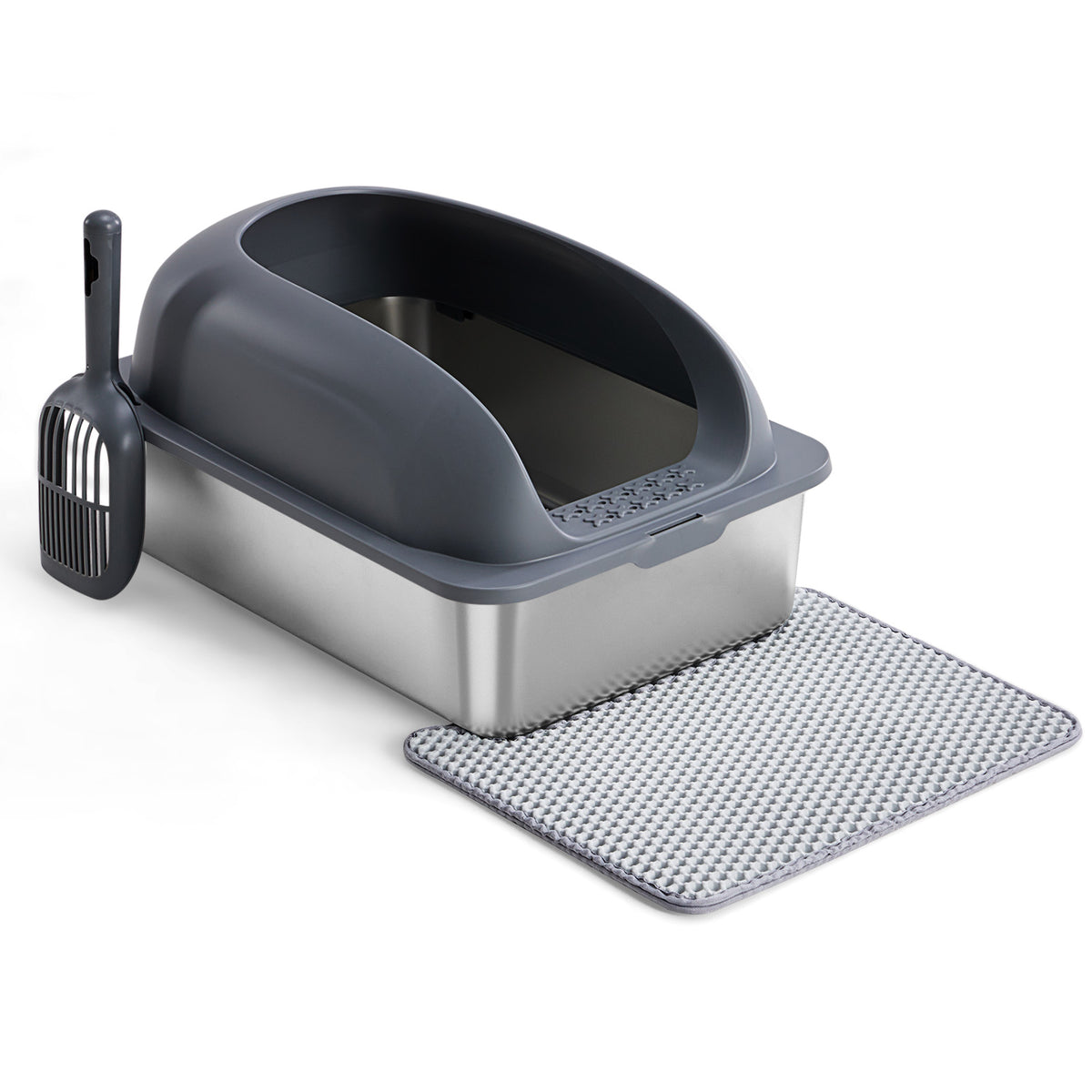 Cat litter box with scoop and mat on a white background